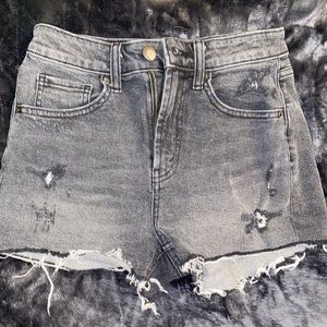 Black distressed jean shorts